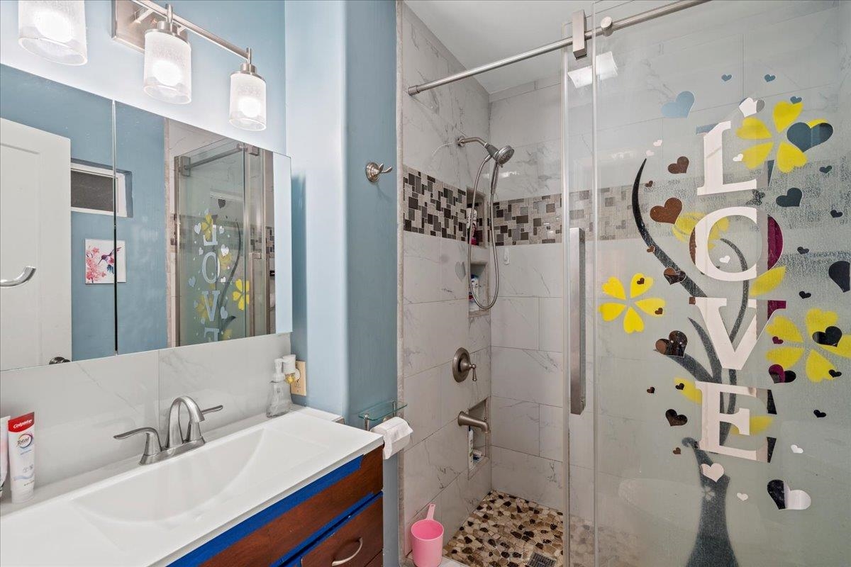 110 Aoloa Loop Kahului, HI 96732 - Photo 22 of 46 a bathroom with a sink and a mirror