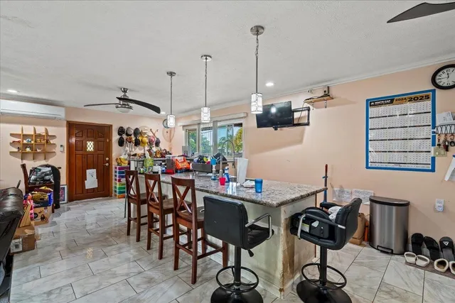 a view of a dining room with furniture
