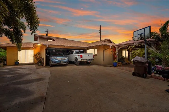 a car parked in front of a house