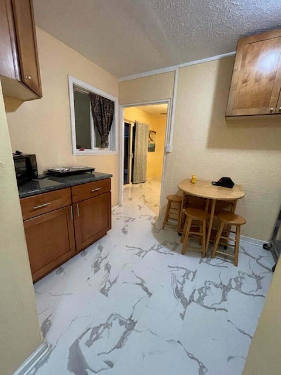 110 Aoloa Loop Kahului, HI 96732 - Photo 42 of 46 a spacious bathroom with a sink and a mirror