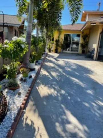 a view of a car park in front of house