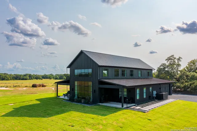 a view of a house with a swimming pool