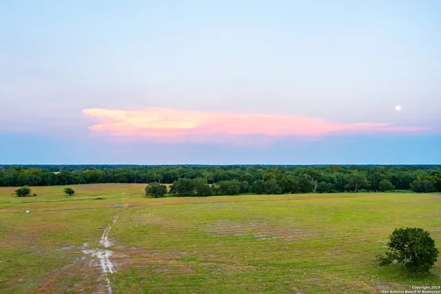 a view of a city with an ocean