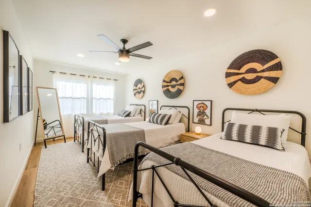 a bedroom with a bed and dresser