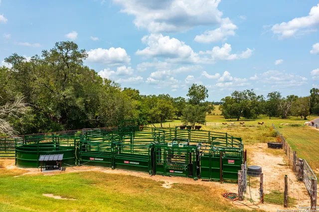 a view of a lake with a house in the background