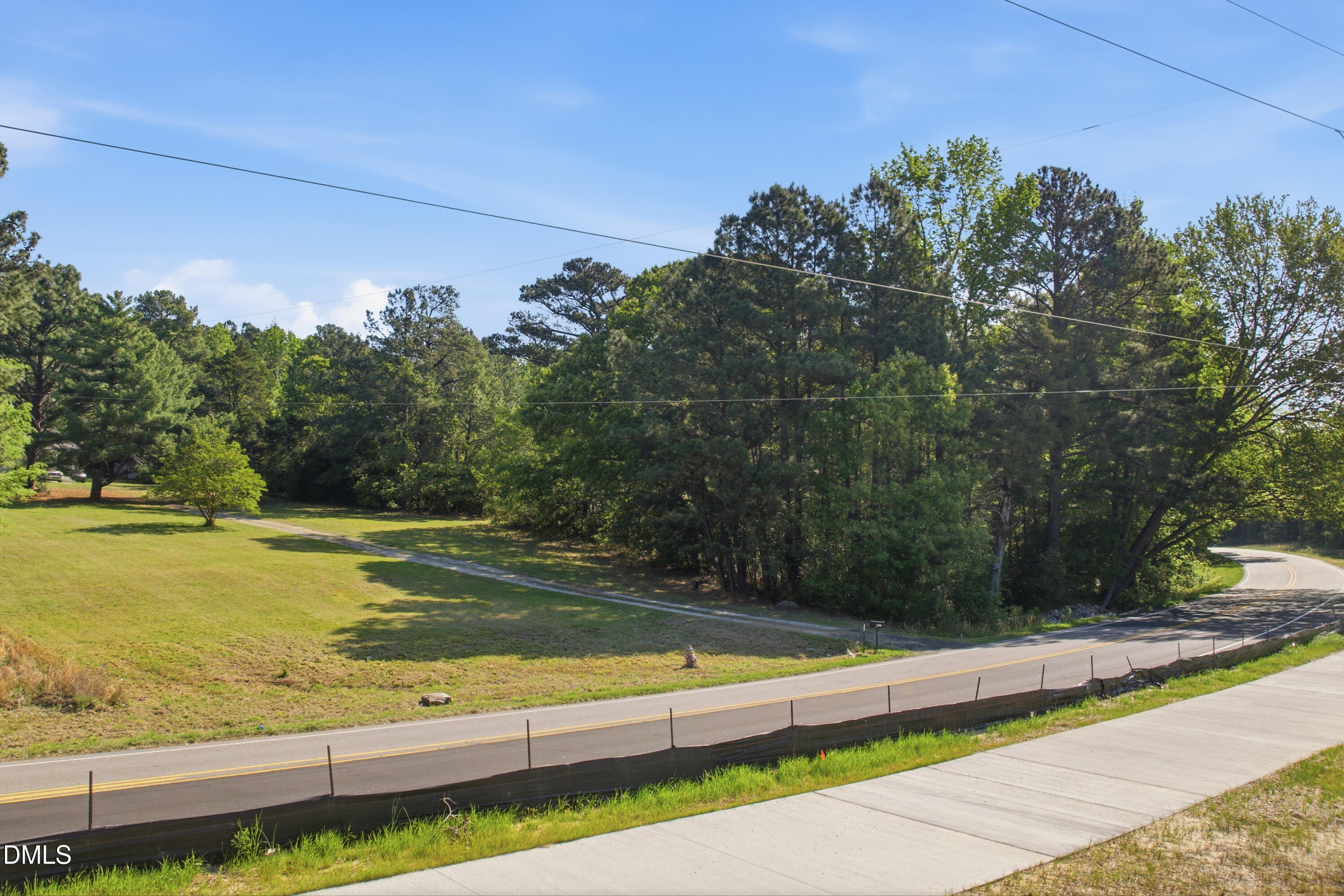7101 Battle Bridge Road Raleigh, NC 27610 - Photo 9 of 13 a view of a yard with an outdoor space