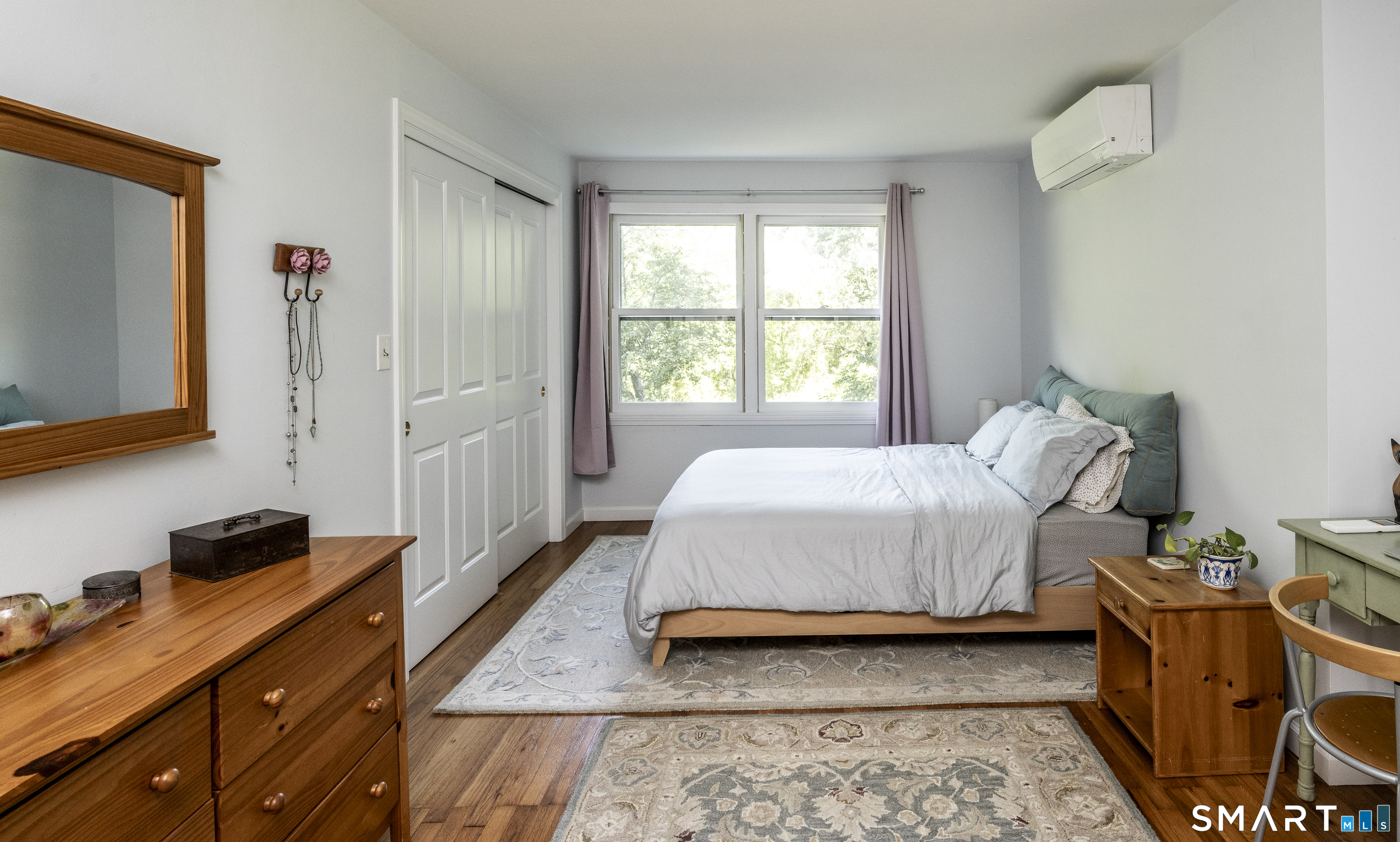 7 Chimney Rock Road Kent, CT 06757 - Photo 17 of 35 a bedroom with a bed and a dresser in it
