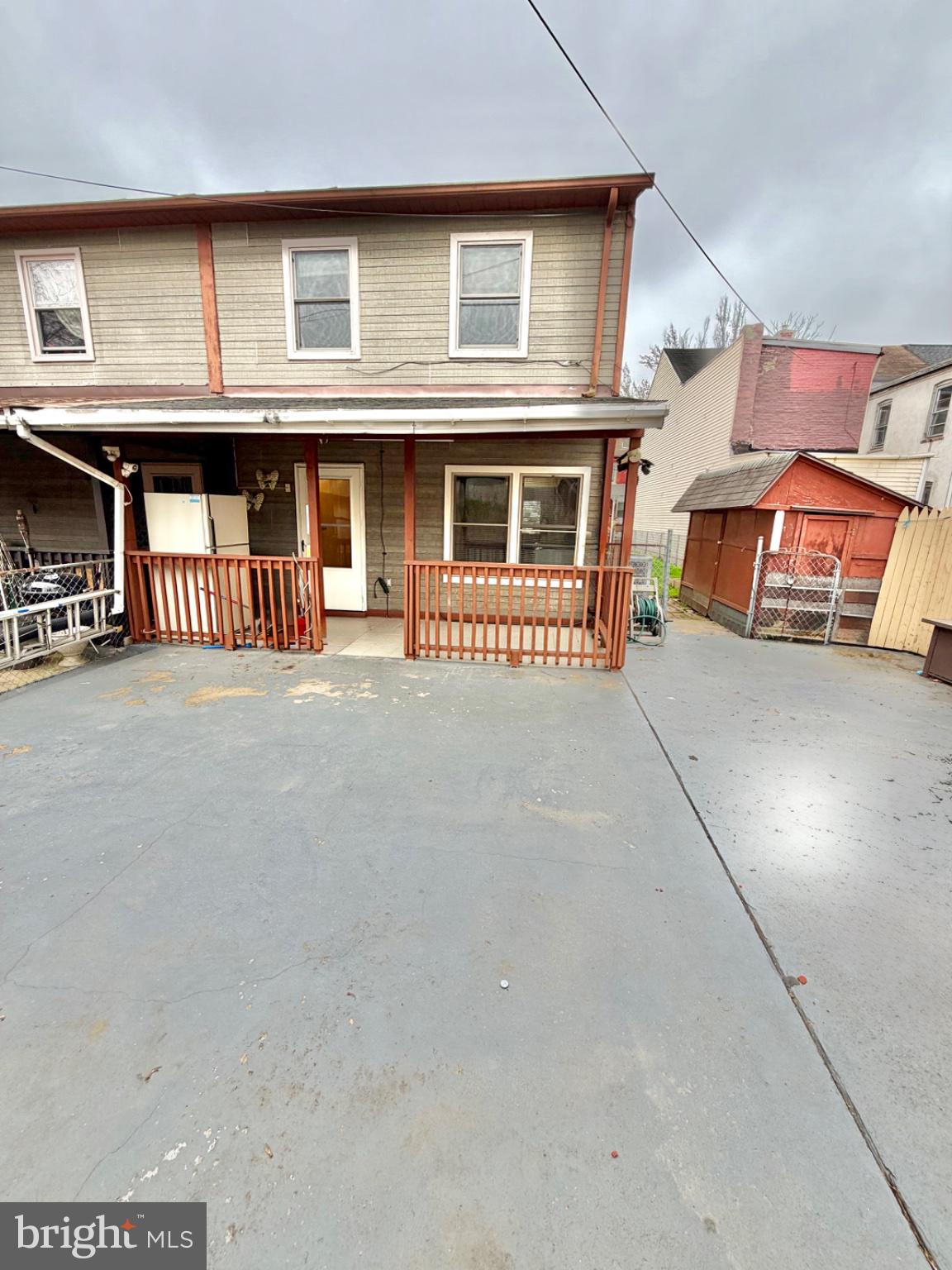 418 Green Street Lancaster, PA 17602 - Photo 25 of 26 a view of a house with large windows and a garage