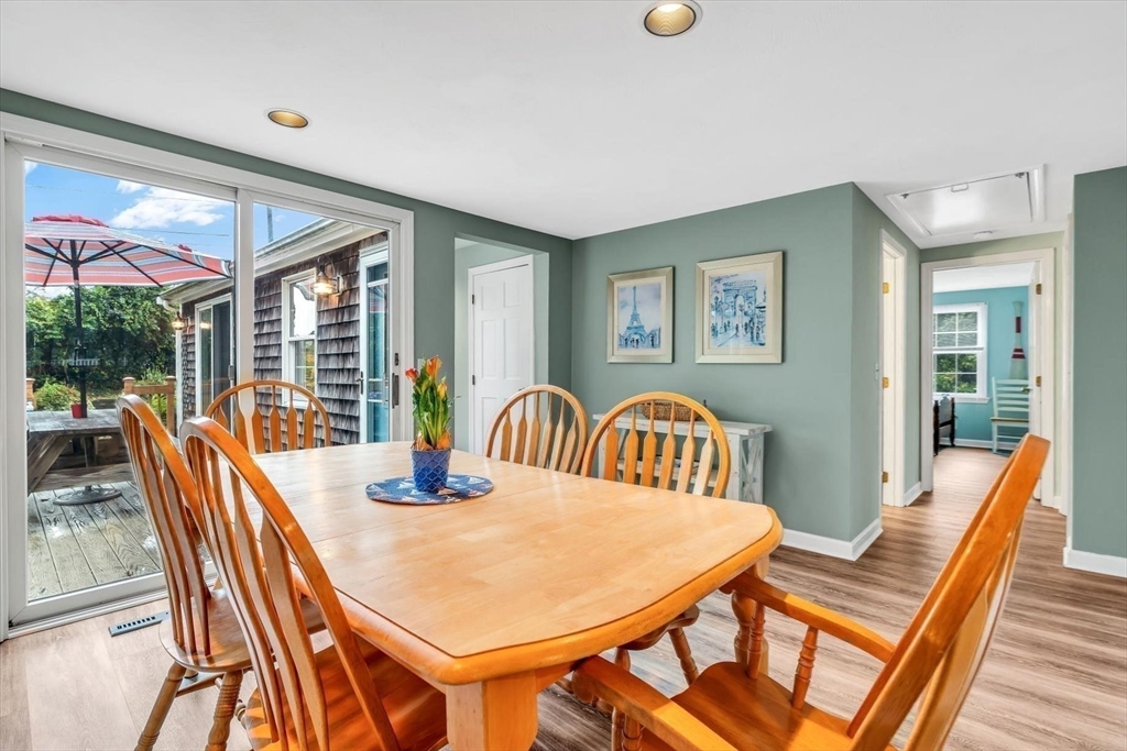30 Cove Road Eastham, MA 02642 - Photo 17 of 42 a view of a dining room with furniture window and outside view