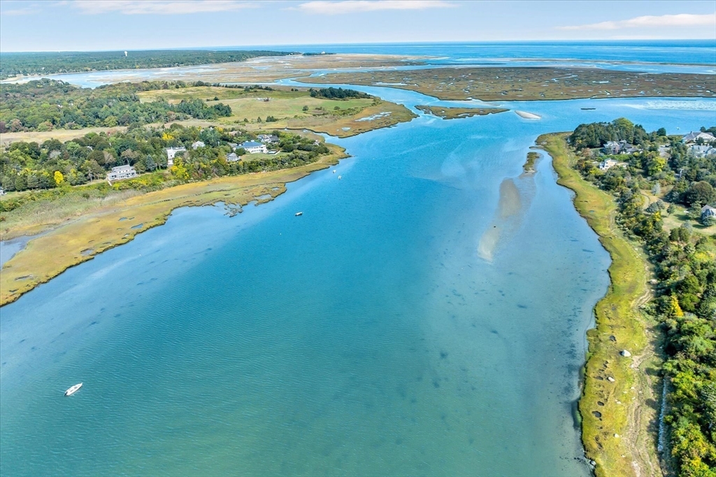 30 Cove Road Eastham, MA 02642 - Photo 2 of 42 a view of an ocean from a building