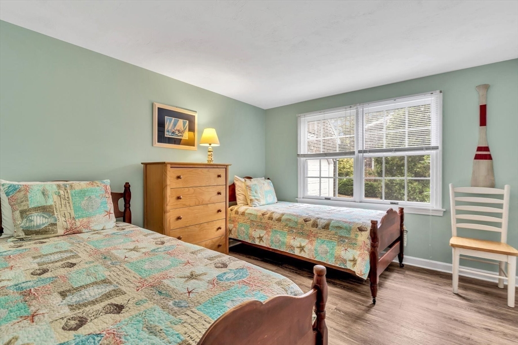 30 Cove Road Eastham, MA 02642 - Photo 23 of 42 a bedroom with a bed and a window