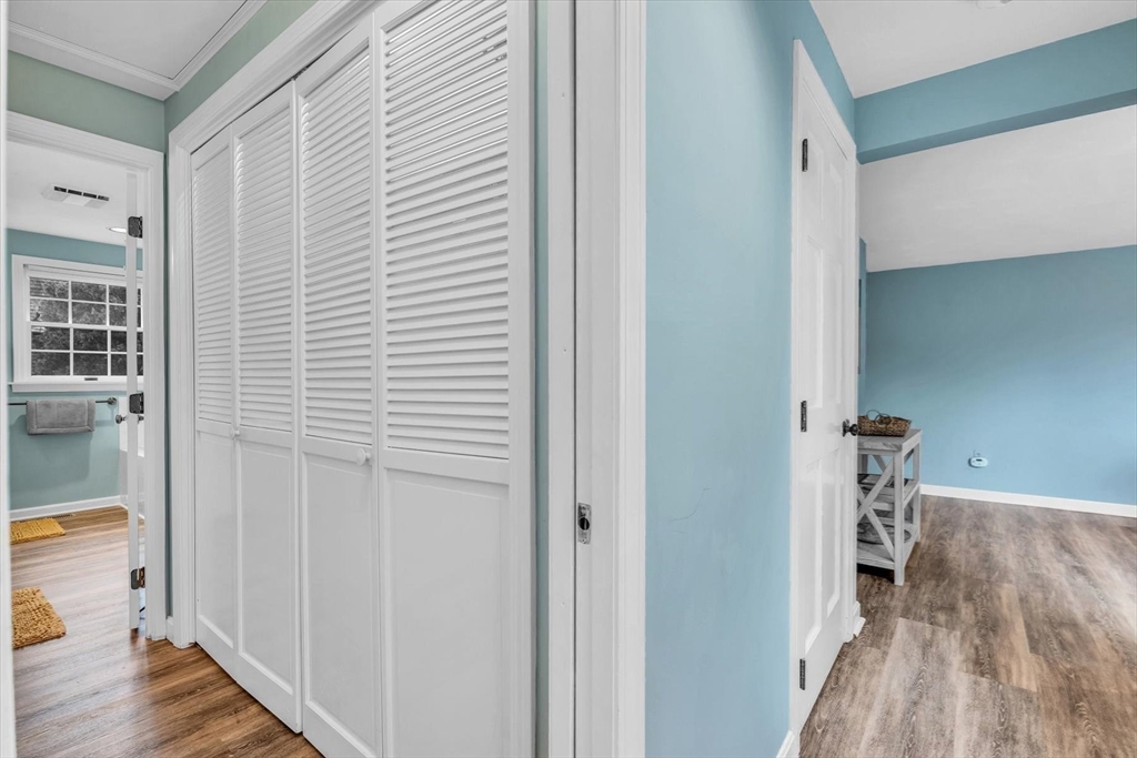 30 Cove Road Eastham, MA 02642 - Photo 25 of 42 a view of hallway with wooden floor