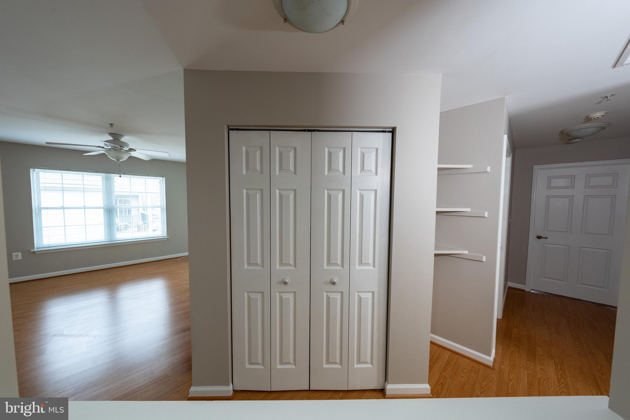 6506 Ridenour Way East, Unit 3A Eldersburg, MD 21784 - Photo 15 of 24 a view of a hallway with wooden floor