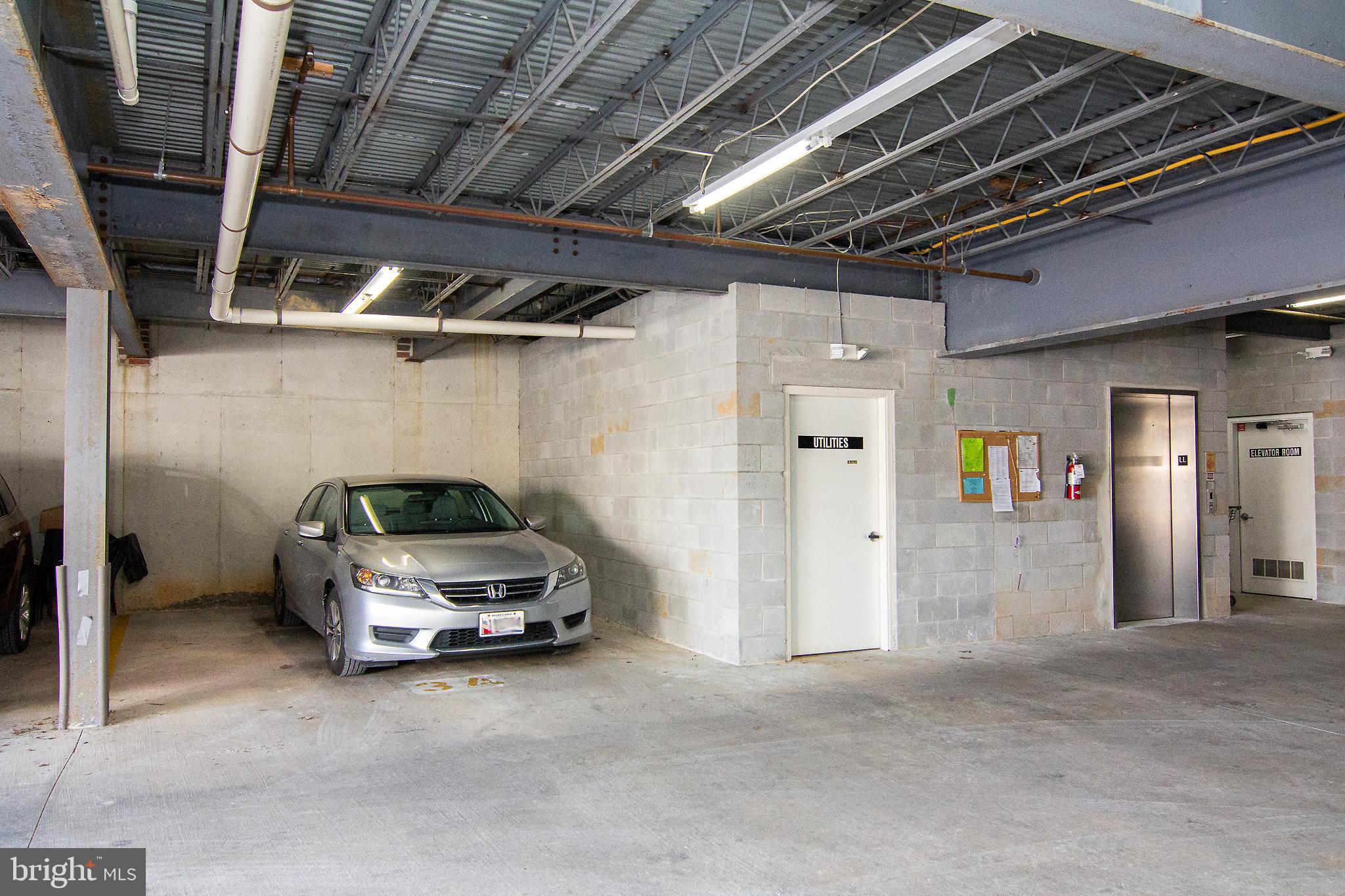 6506 Ridenour Way East, Unit 3A Eldersburg, MD 21784 - Photo 19 of 24 a car parked in a garage
