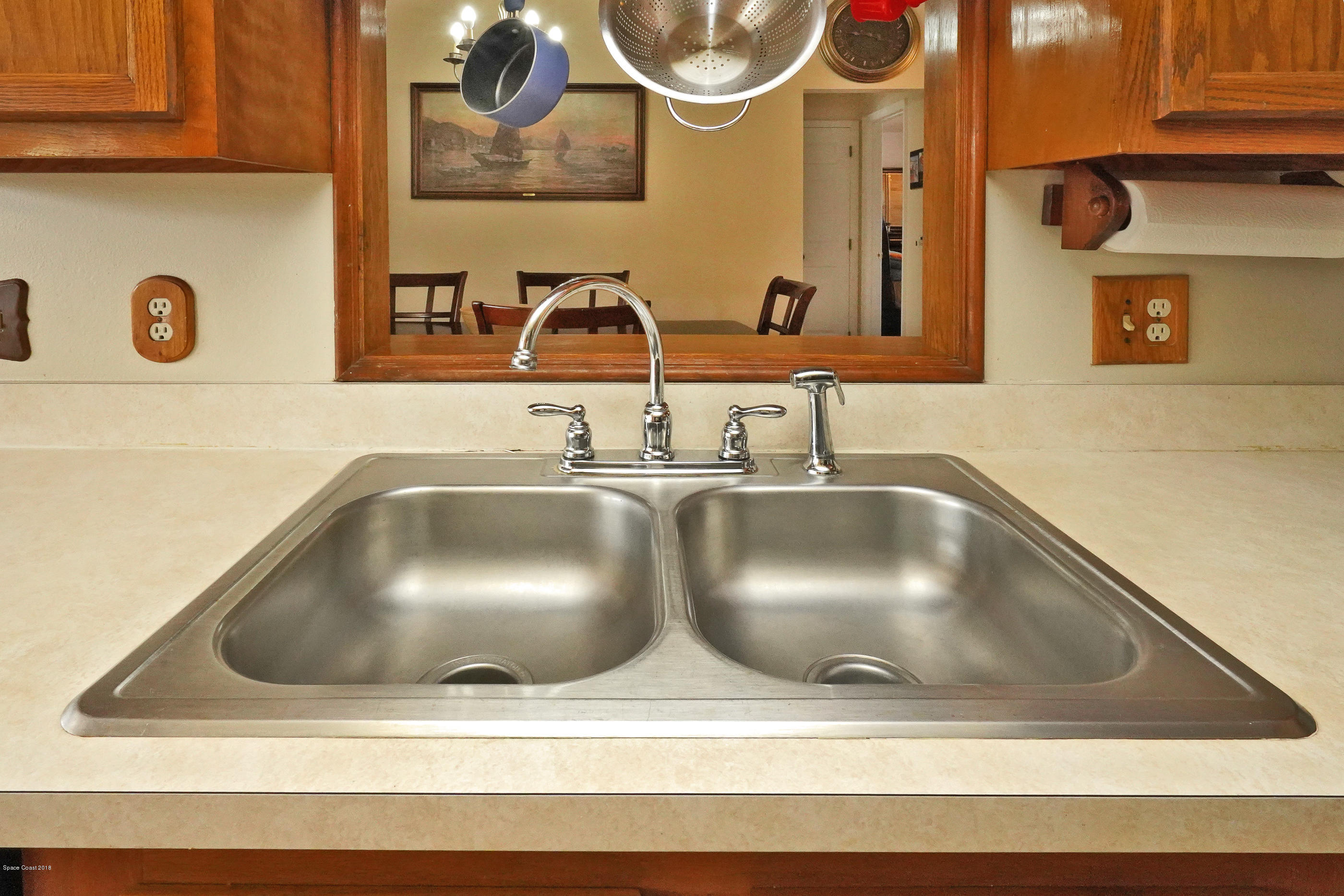 862 Gardener Road Rockledge, FL 32955 - Photo 20 of 31 Double Sink with View to Dining RM