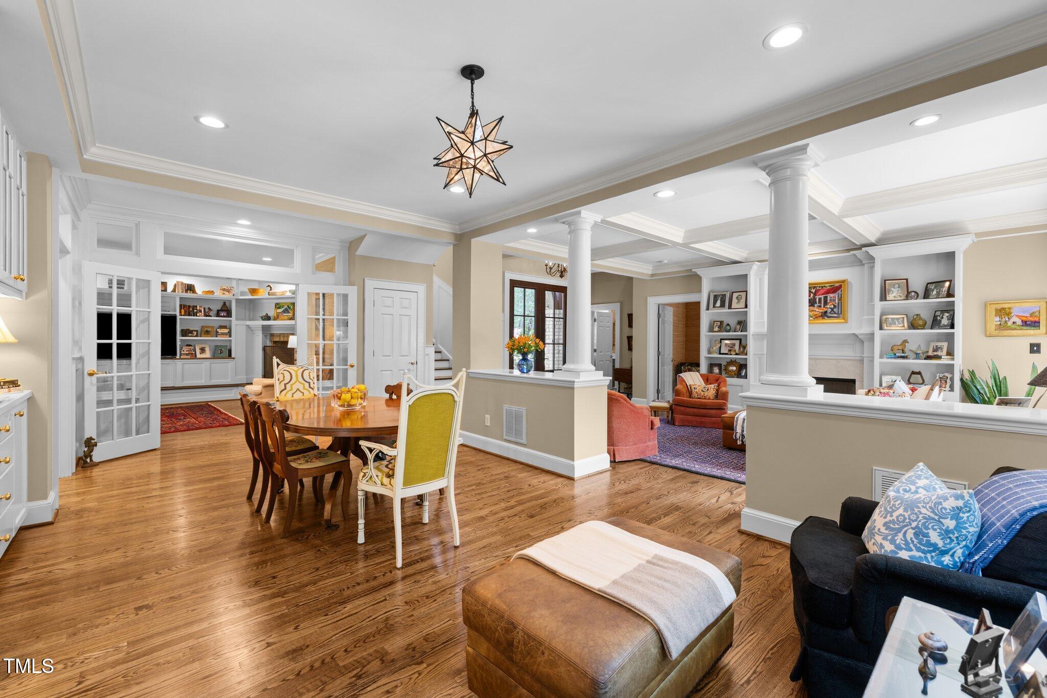 1624 Hopkins Road Bahama, NC 27503 - Photo 18 of 100 a view of a dining room with furniture and wooden floor