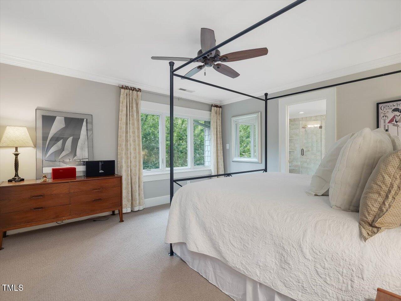1624 Hopkins Road Bahama, NC 27503 - Photo 41 of 100 a spacious bedroom with a bed and a window