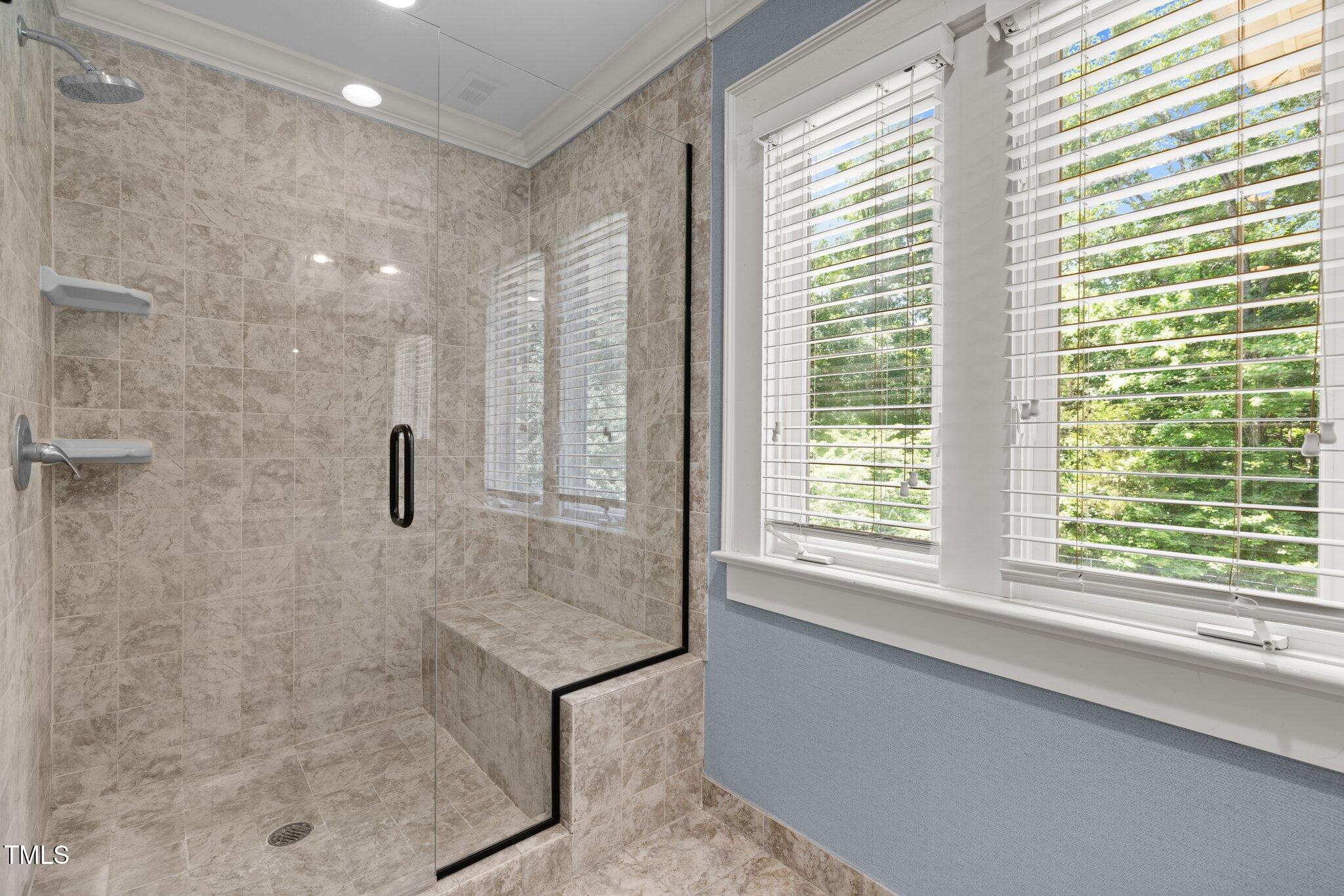 1624 Hopkins Road Bahama, NC 27503 - Photo 47 of 100 a bathroom with a shower and a bathtub