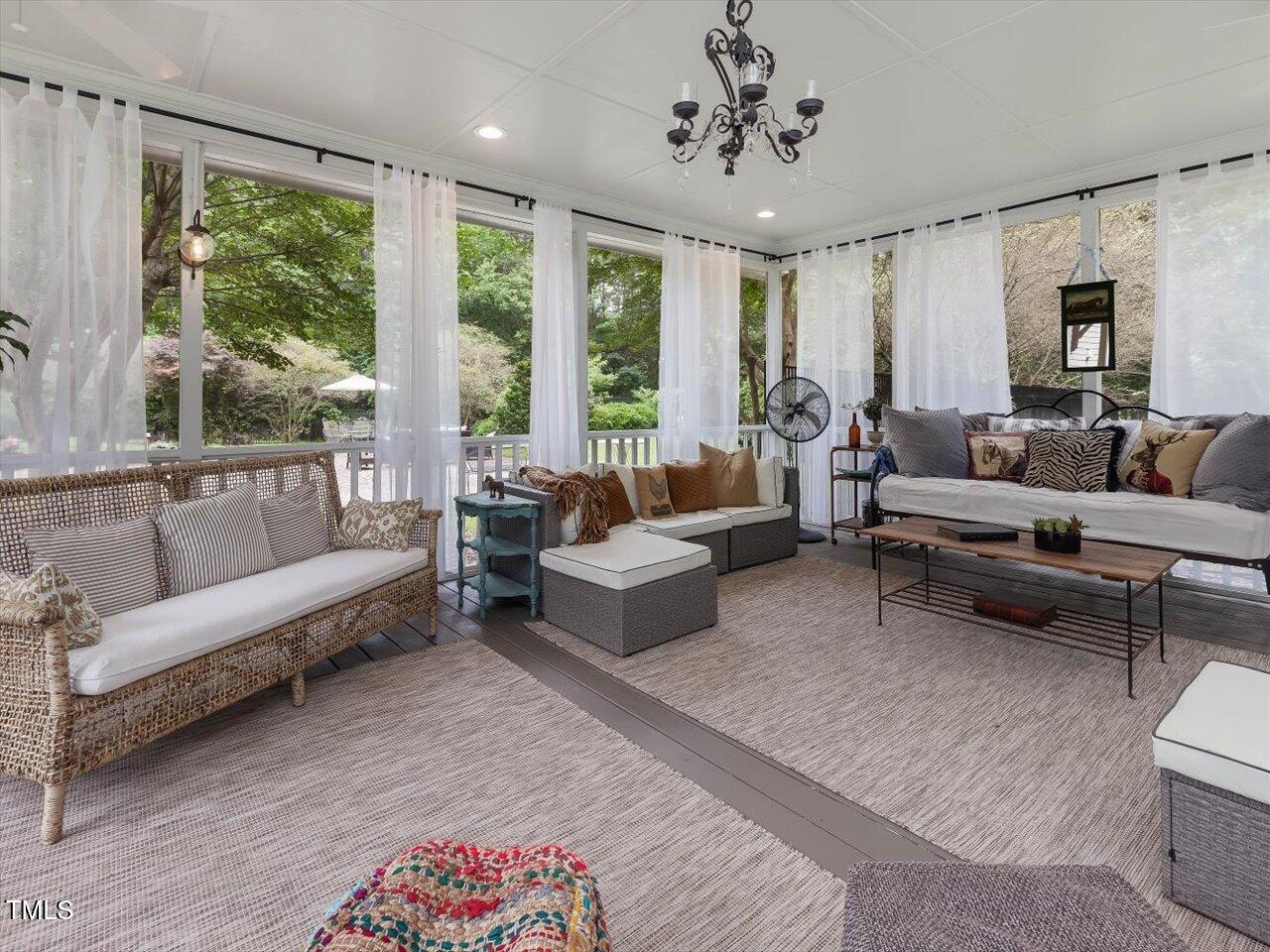 1624 Hopkins Road Bahama, NC 27503 - Photo 55 of 100 a living room with furniture and a large window