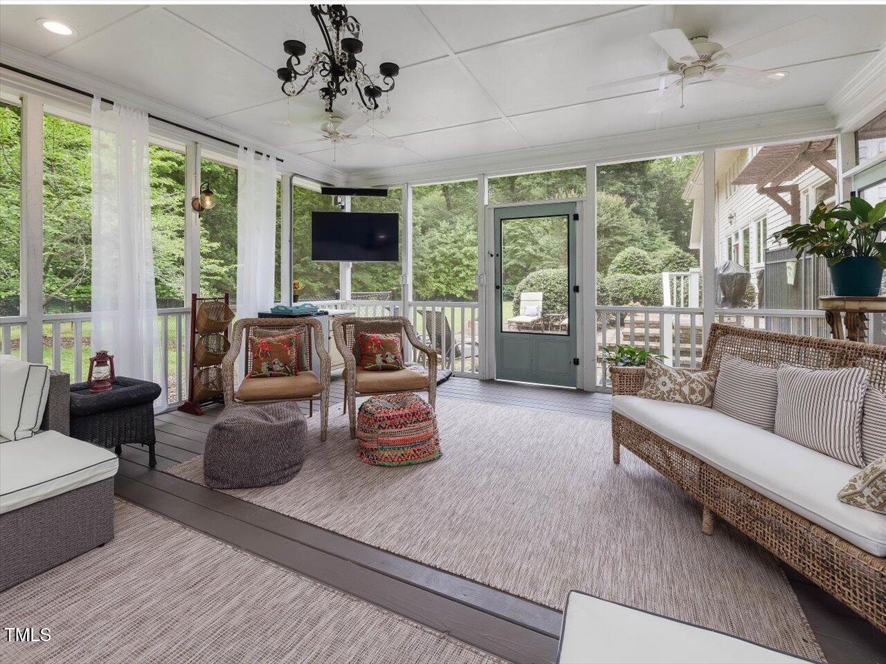 1624 Hopkins Road Bahama, NC 27503 - Photo 56 of 100 a living room with furniture and a large window