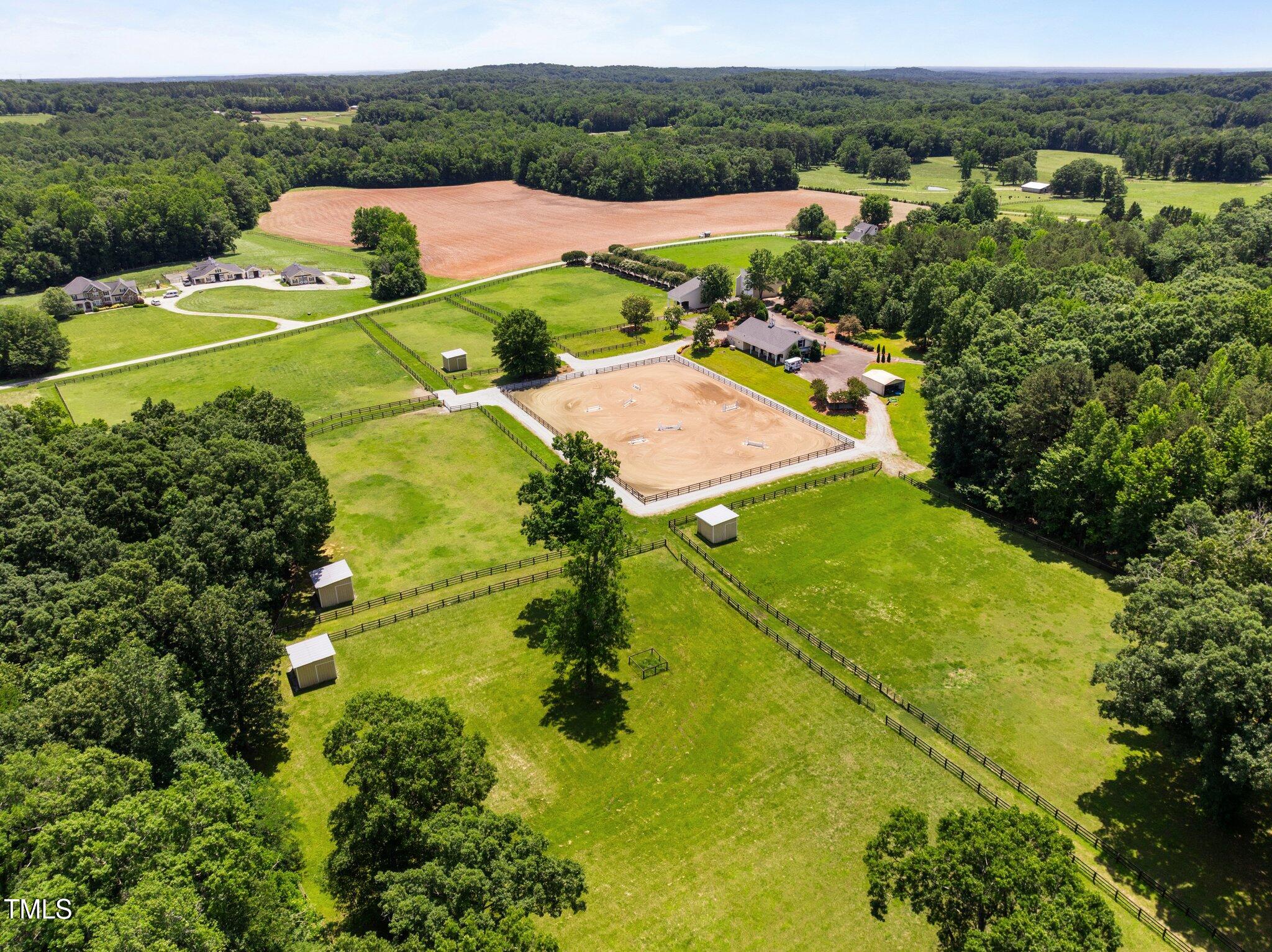 1624 Hopkins Road Bahama, NC 27503 - Photo 75 of 100 an aerial view of residential houses with outdoor space and street view
