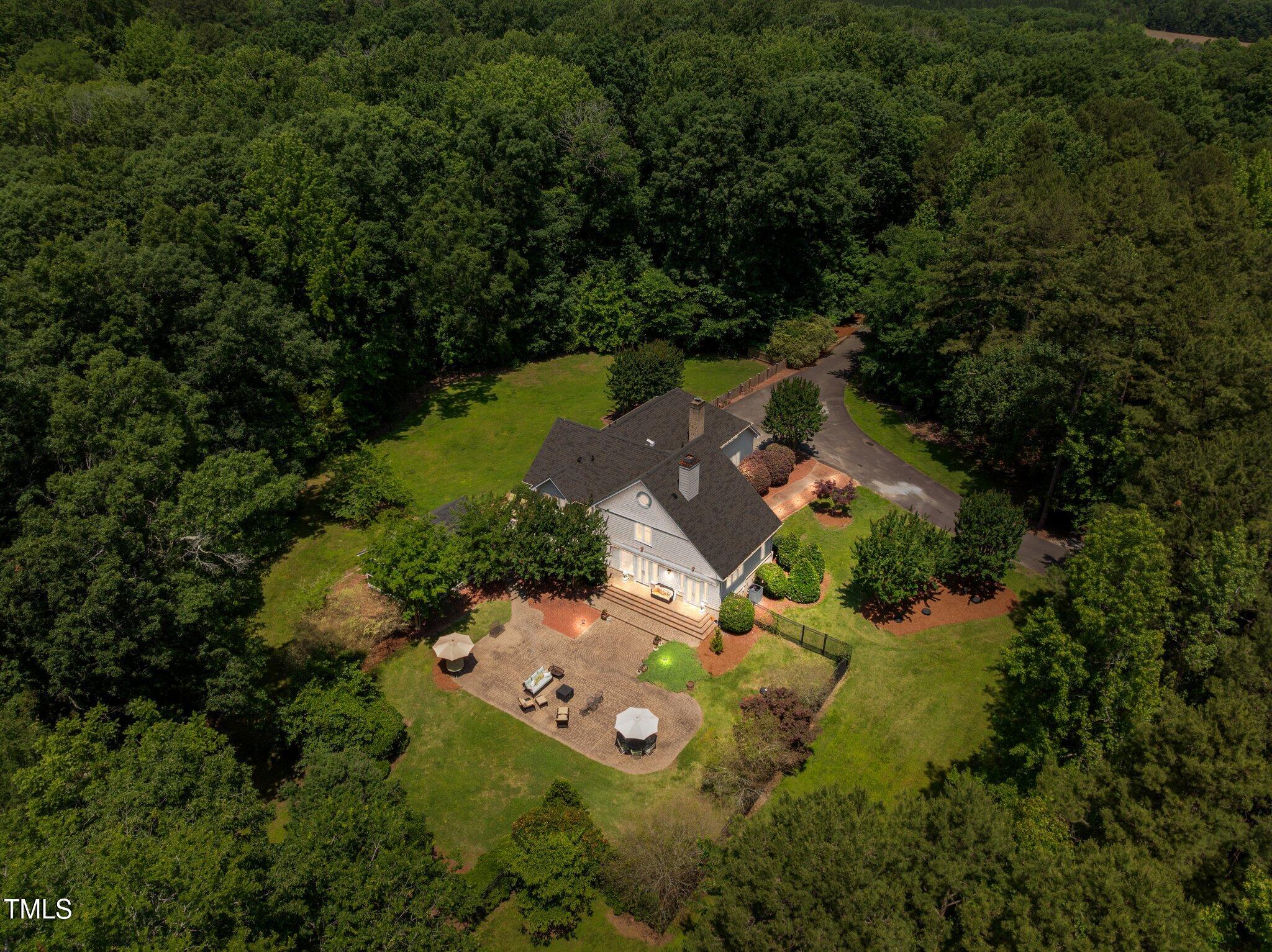1624 Hopkins Road Bahama, NC 27503 - Photo 8 of 100 an aerial view of a house with yard swimming pool and outdoor seating