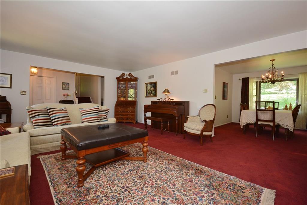 136 Buss Road Aliquippa, PA 15001 - Photo 2 of 25 Formal Living room, with tons of space and opens to Formal Dining Room.
