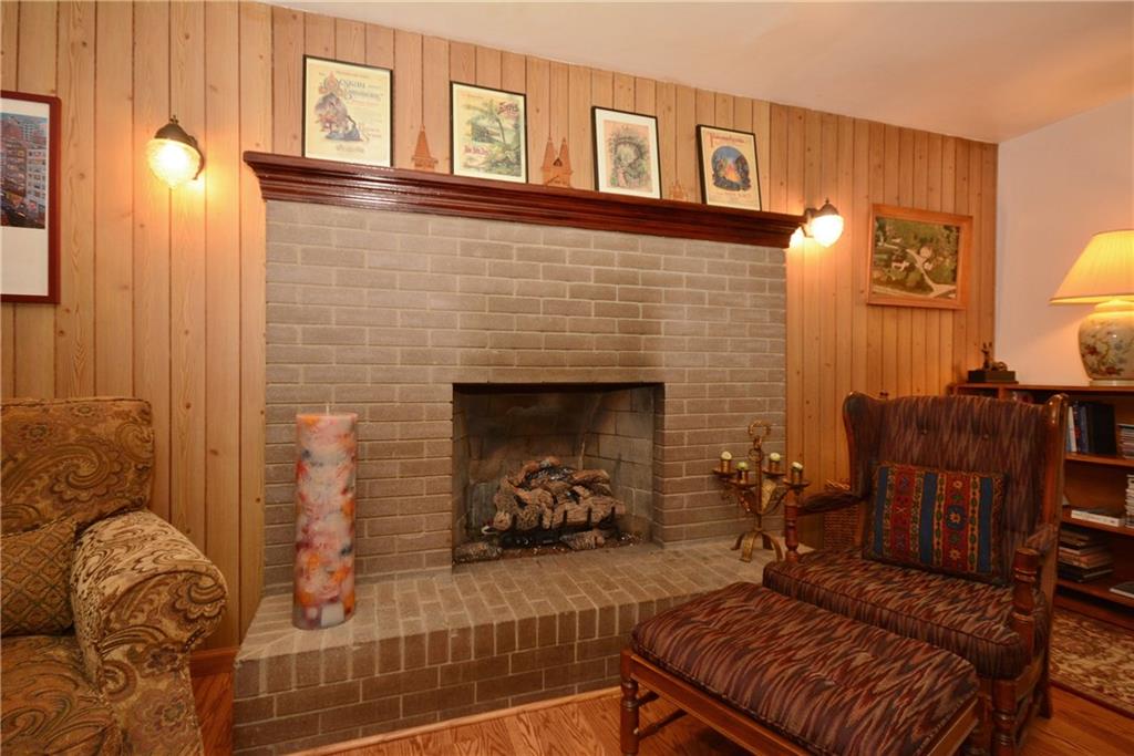 136 Buss Road Aliquippa, PA 15001 - Photo 9 of 25 Brick Fireplace with gas logs
