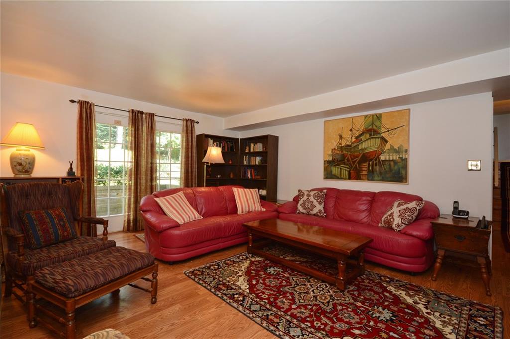 136 Buss Road Aliquippa, PA 15001 - Photo 10 of 25 Family room with sliding door to backyard.