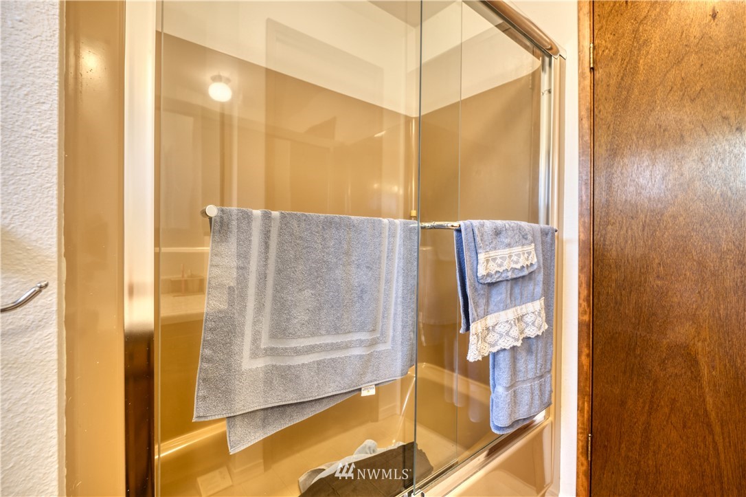 542 Boundary Bay Road Point Roberts, WA 98281 - Photo 14 of 23 a bathroom with a shower and a sink