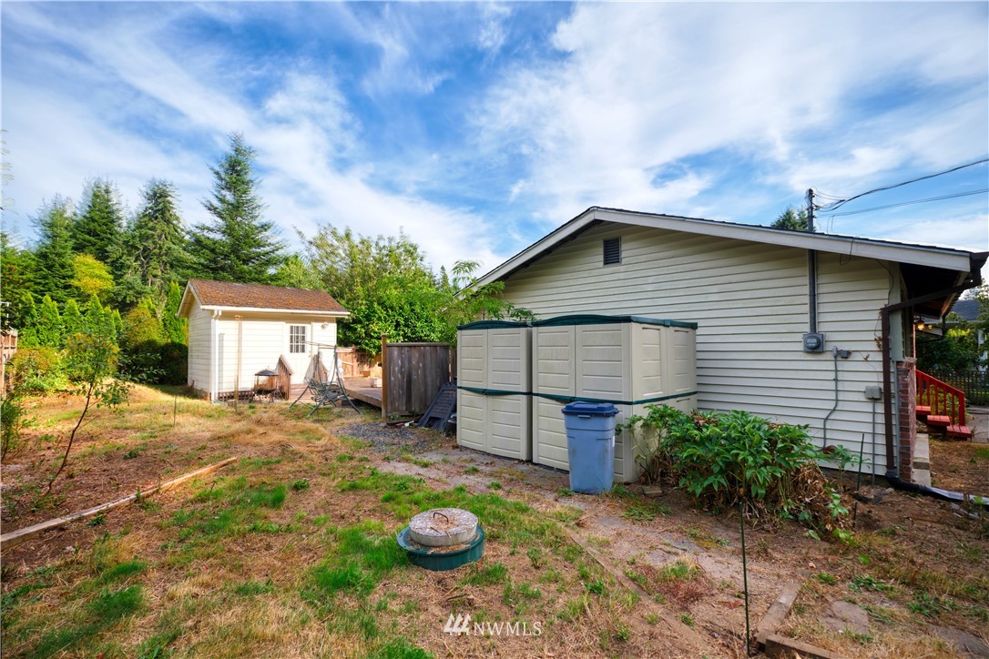 542 Boundary Bay Road Point Roberts, WA 98281 - Photo 15 of 23 a front view of a house with garden