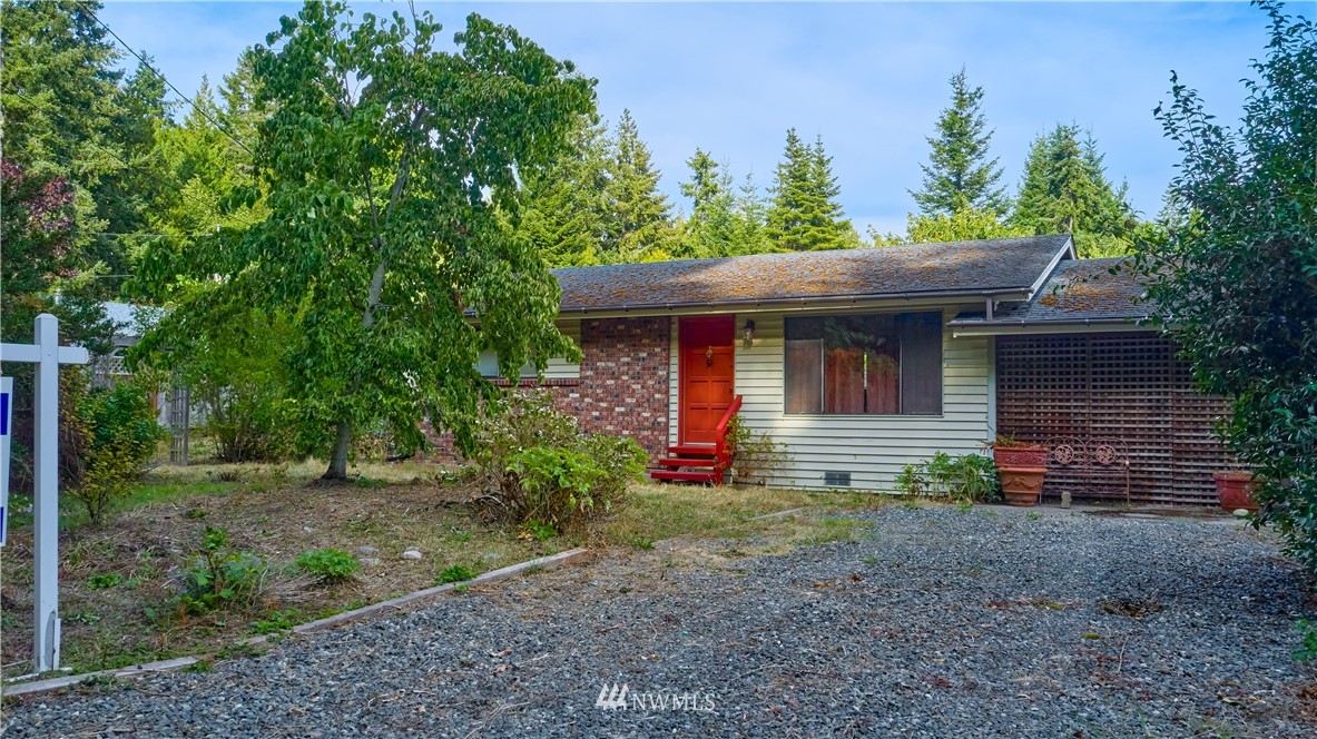 542 Boundary Bay Road Point Roberts, WA 98281 - Photo 19 of 23 a view of a house with a yard