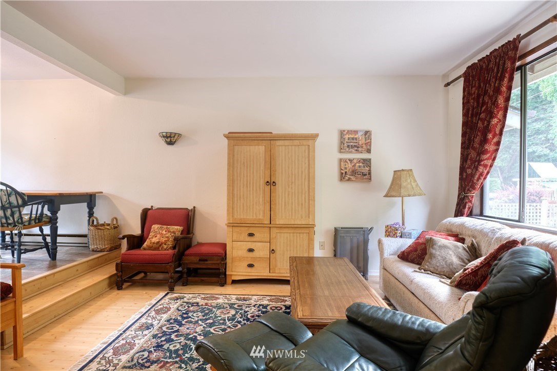 542 Boundary Bay Road Point Roberts, WA 98281 - Photo 5 of 23 a living room with furniture and a rug