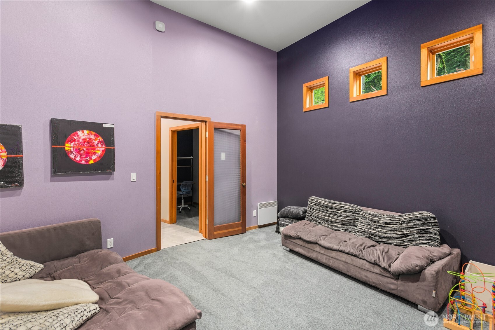 6520 East Mercer Way Mercer Island, WA 98040 - Photo 12 of 36 a bedroom with a bed and a couch