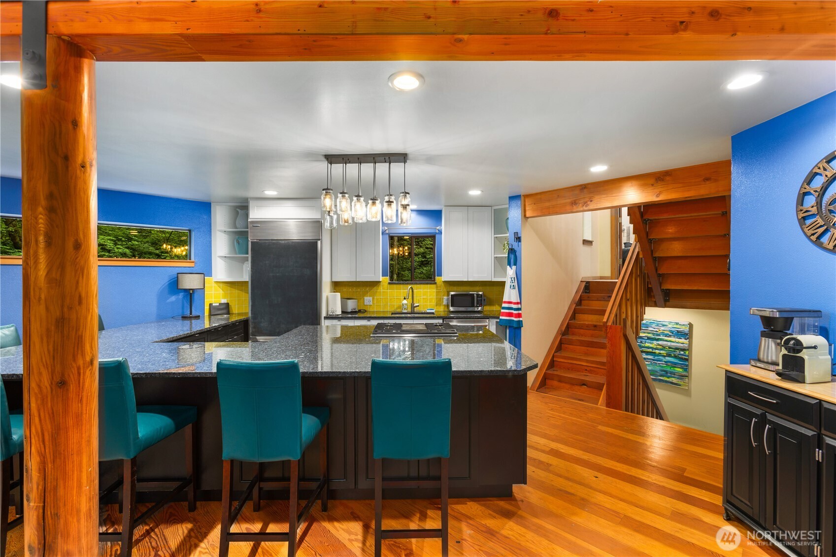 6520 East Mercer Way Mercer Island, WA 98040 - Photo 15 of 36 a dining room with furniture and wooden floor