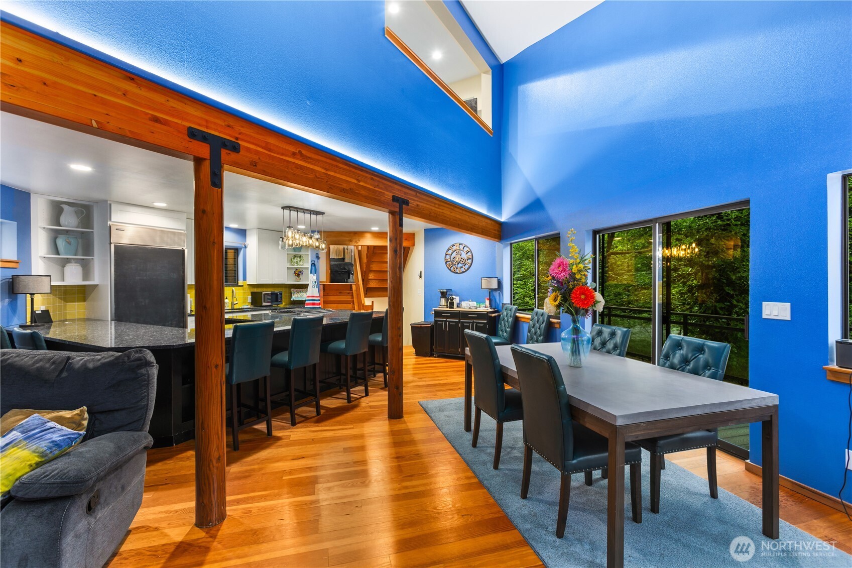 6520 East Mercer Way Mercer Island, WA 98040 - Photo 20 of 36 a dining room with furniture and a floor to ceiling window