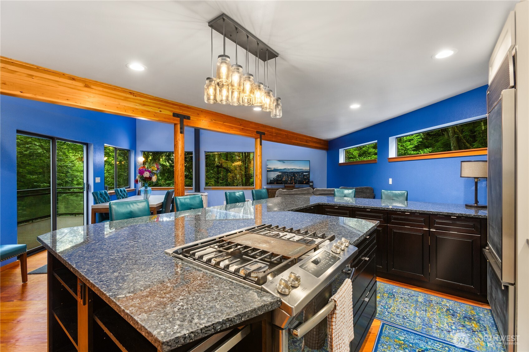 6520 East Mercer Way Mercer Island, WA 98040 - Photo 22 of 36 a kitchen with stainless steel appliances granite countertop a stove a sink and a microwave