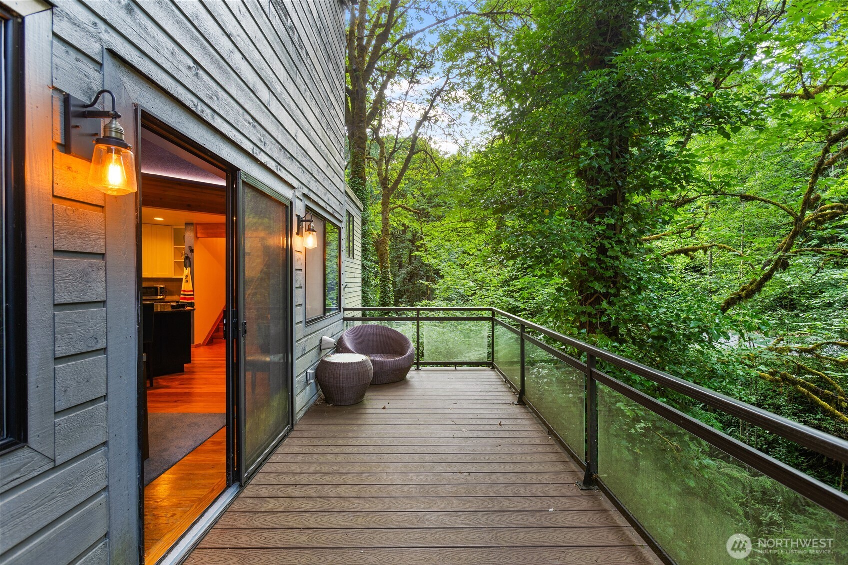 6520 East Mercer Way Mercer Island, WA 98040 - Photo 34 of 36 a balcony with chairs and wooden fence