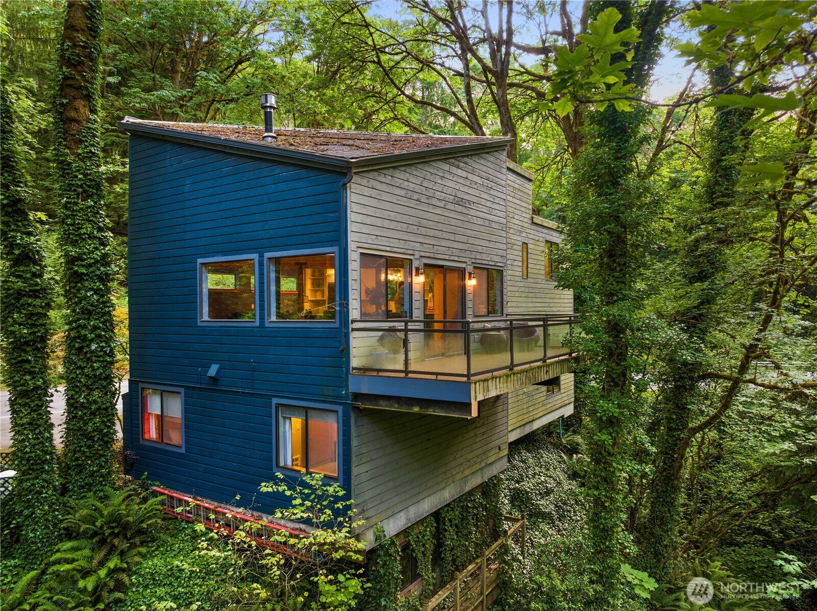 6520 East Mercer Way Mercer Island, WA 98040 - Photo 36 of 36 a front view of a house with balcony