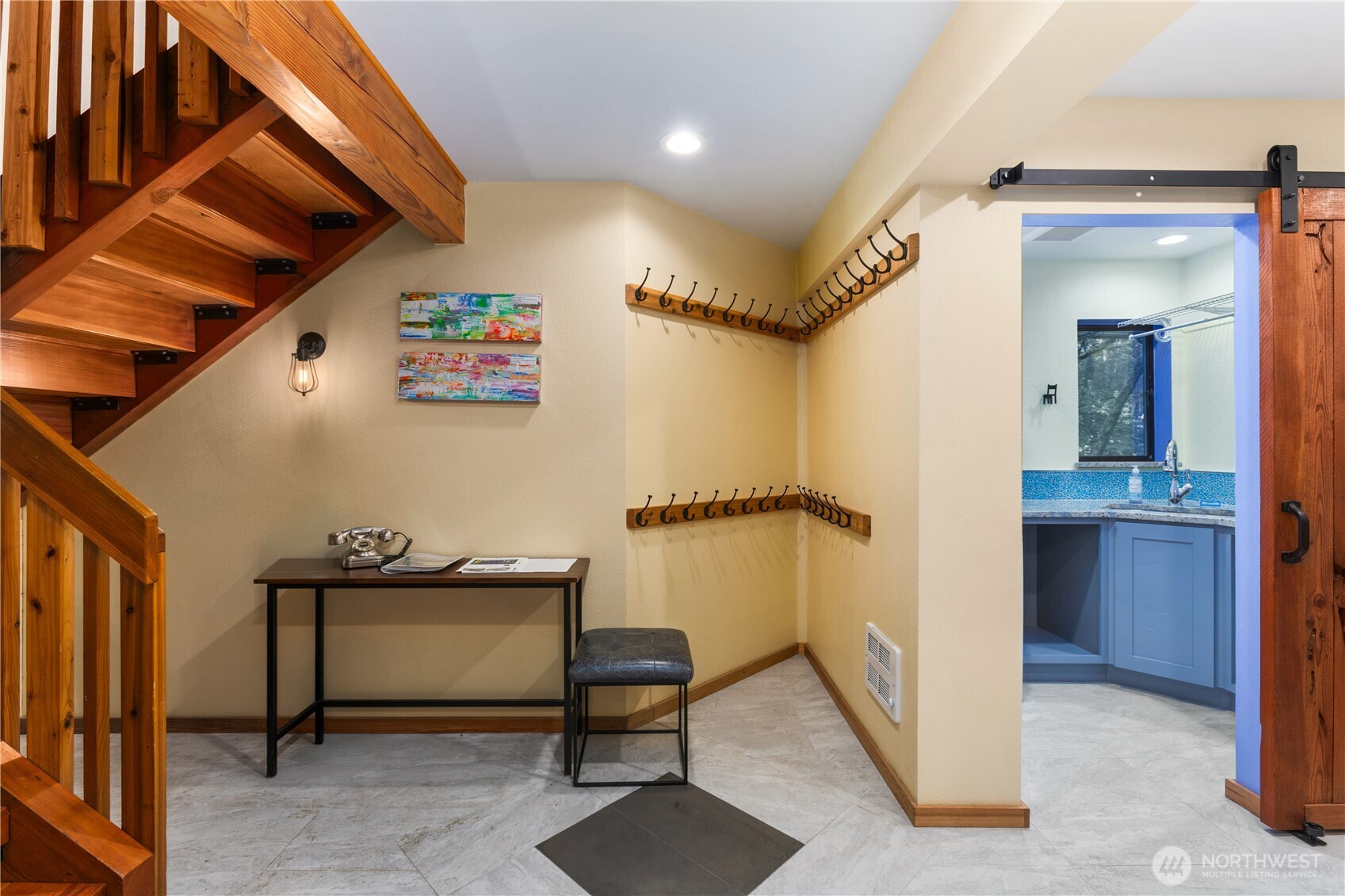 6520 East Mercer Way Mercer Island, WA 98040 - Photo 4 of 36 a view of a hallway and a livingroom with furniture