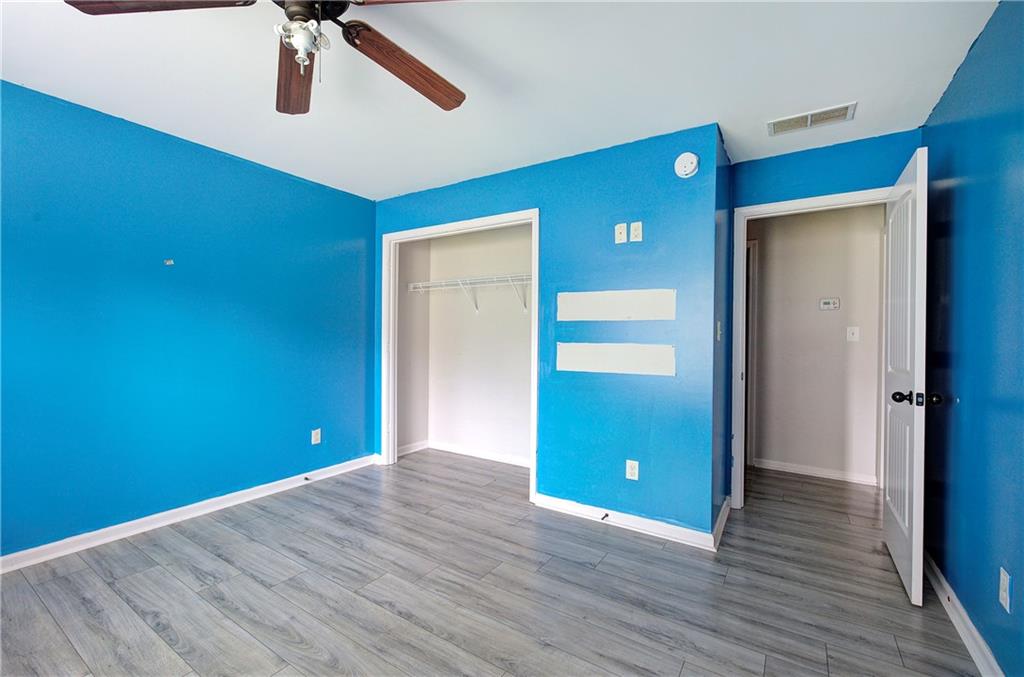 561 Holland Road Dallas, GA 30157 - Photo 21 of 48 wooden floor in an empty room with a window