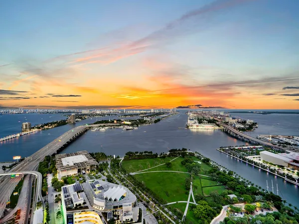 an aerial view of multiple house with outdoor space