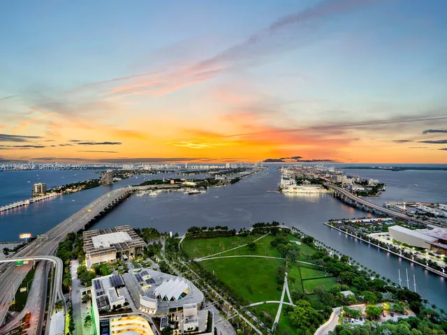 an aerial view of multiple house with outdoor space