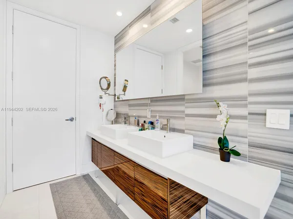 a kitchen with a sink and a stove