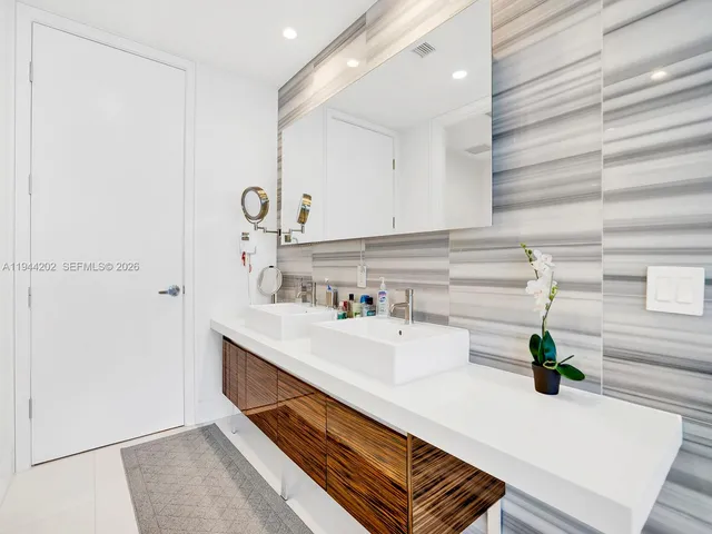 a kitchen with a sink and a stove