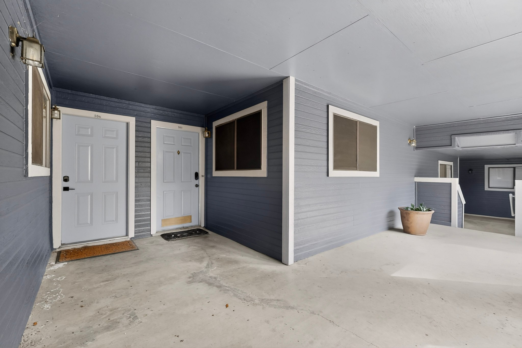 2500 Burleson Road, Unit 506 Austin, TX 78741 - Photo 5 of 23 an empty room with closet and mirrors