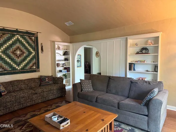 a living room with furniture and a couch