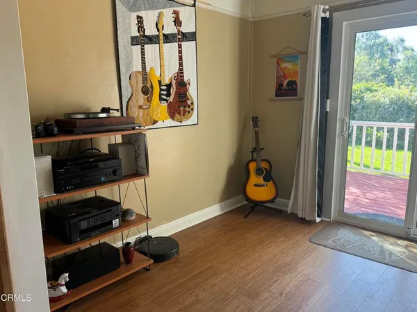 a room with gym equipment and a window