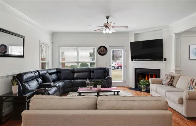 a bedroom with a bed and a chair