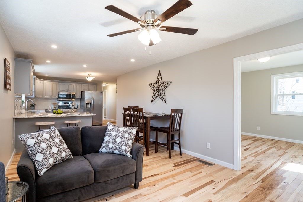 87 McBride Road Wales, MA 01081 - Photo 12 of 36 a living room with furniture and kitchen view